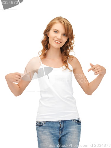 Image of smiling teenage girl in blank white t-shirt