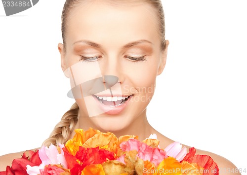 Image of lovely woman with red flowers