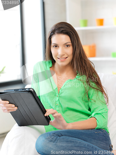 Image of happy woman with tablet pc computer