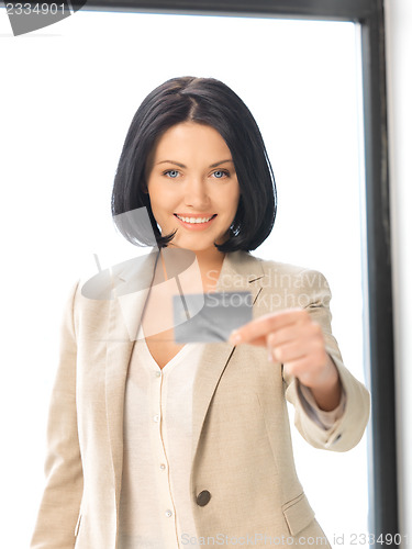 Image of happy woman with credit card