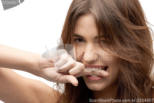Image of woman biting her finger
