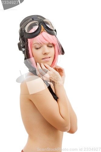 Image of topless pink hair girl in aviator helmet