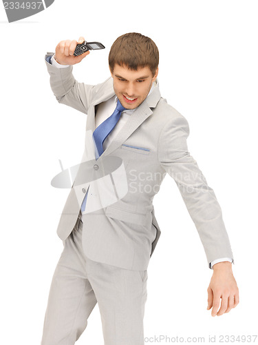 Image of angry man with cell phone