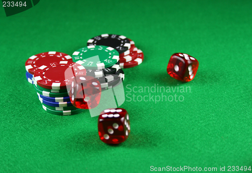 Image of An Action shot of 5 dice thrown onto the table