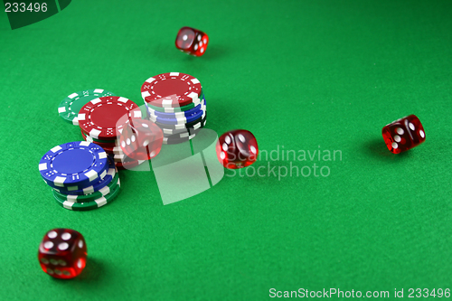 Image of An Action shot of 5 dice thrown onto the table