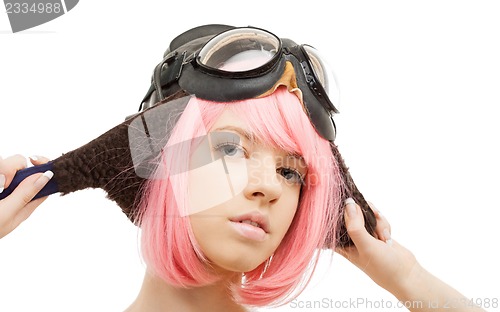 Image of pink hair girl in aviator helmet