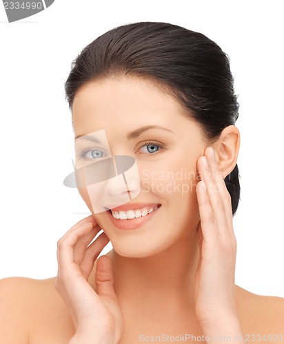 Image of face and hands of beautiful woman