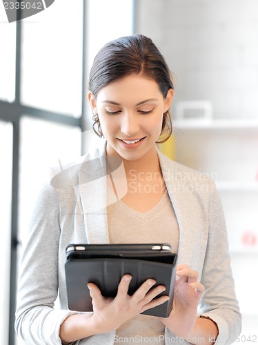 Image of happy woman with tablet pc computer