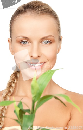 Image of woman with green sprout