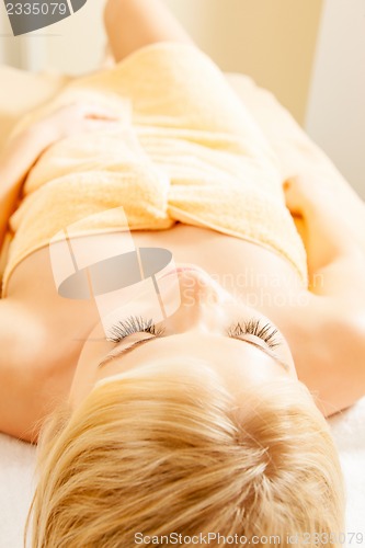 Image of beautiful woman in spa salon