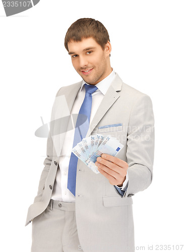 Image of handsome man with euro cash money