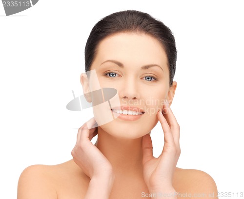 Image of face and hands of beautiful woman