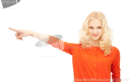 Image of attractive student pointing her finger