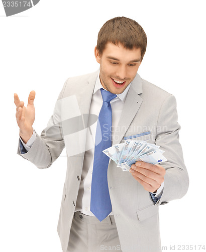 Image of handsome man with euro cash money