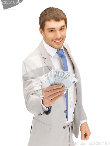 Image of handsome man with euro cash money