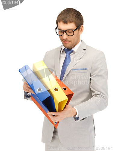 Image of man with folders