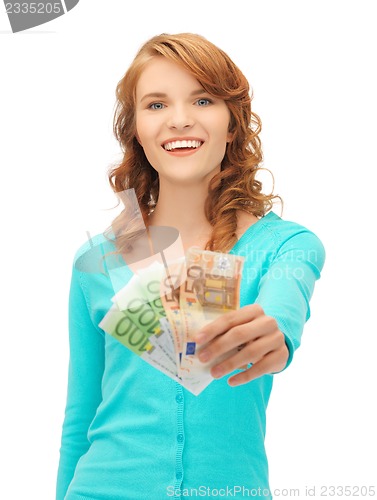 Image of happy teenage girl with euro cash money