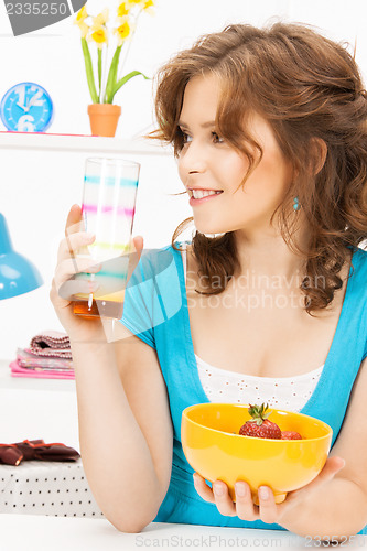 Image of beautiful woman in the kitchen