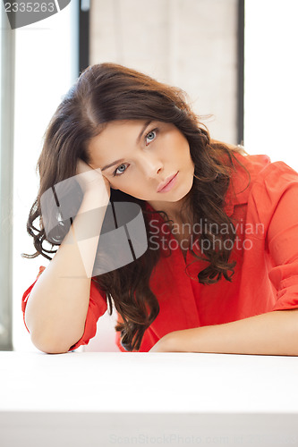 Image of calm and serious woman