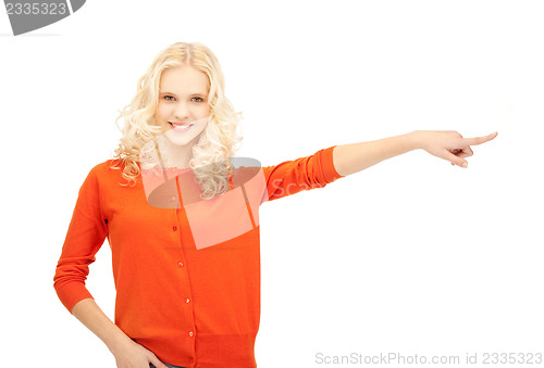 Image of attractive student pointing her finger