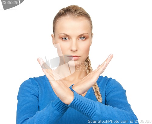 Image of woman making stop gesture