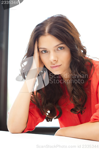 Image of calm and serious woman