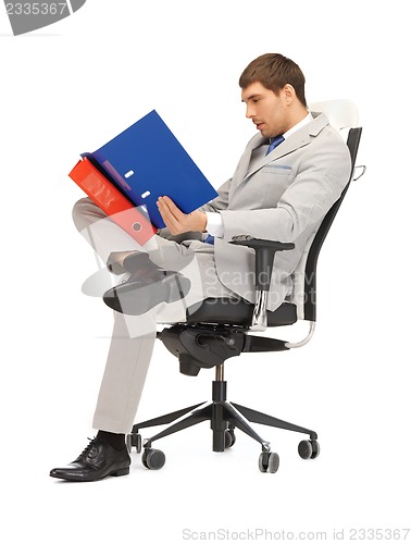 Image of man with folders