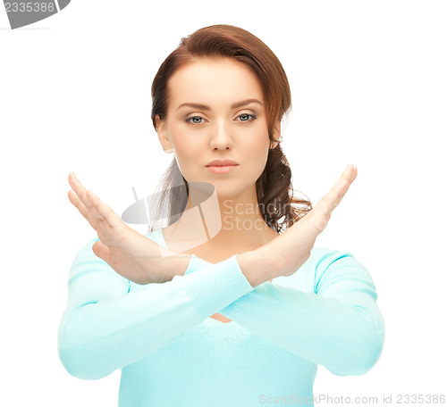 Image of woman making stop gesture