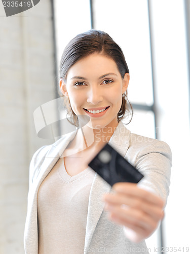 Image of happy woman with credit card