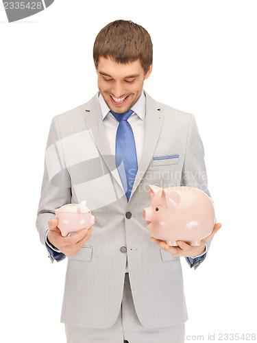 Image of man with piggy bank