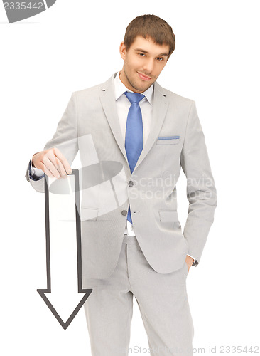 Image of businessman with direction arrow sign