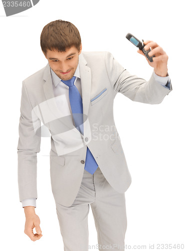 Image of angry man with cell phone