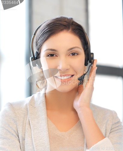 Image of friendly female helpline operator