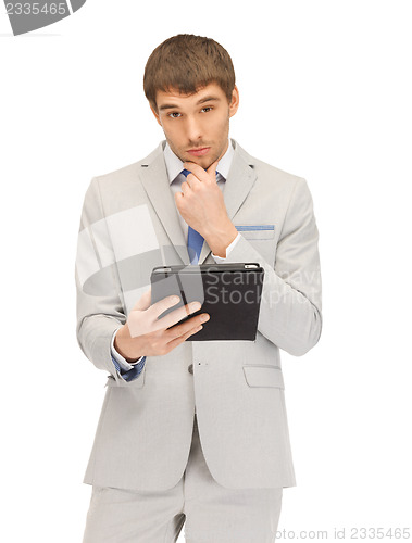 Image of calm man with tablet pc computer