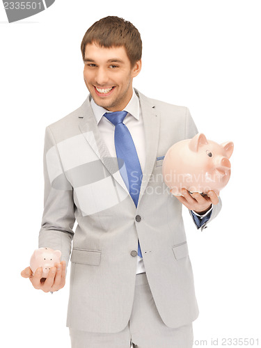 Image of man with piggy bank