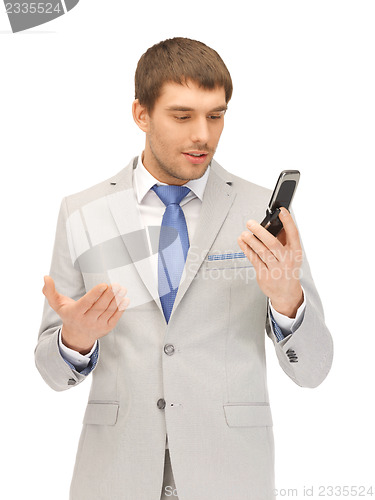 Image of handsome man with cell phone