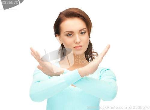 Image of woman making stop gesture