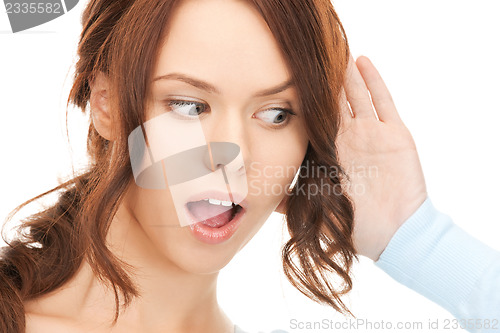 Image of woman listening gossip