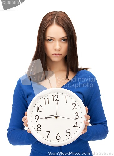 Image of woman holding big clock