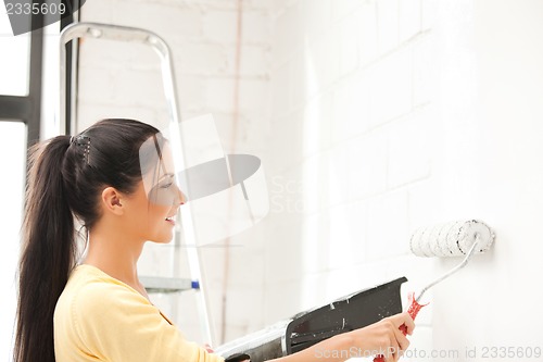Image of lovely housewife painting