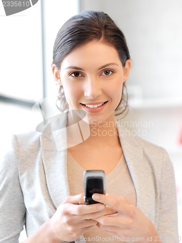 Image of businesswoman with cell phone