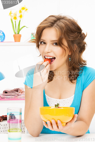 Image of beautiful woman in the kitchen