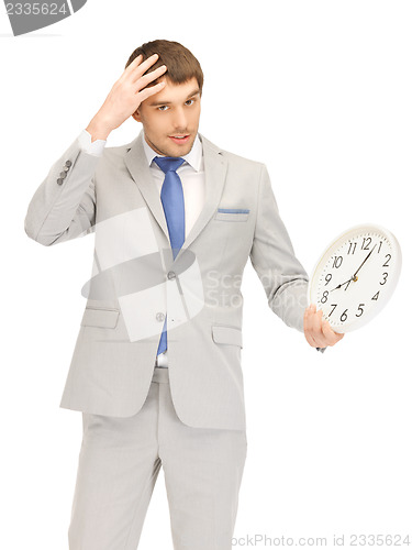 Image of man with clock