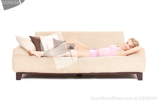 Image of happy woman on sofa