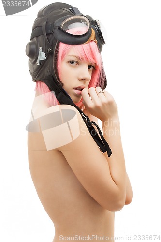 Image of topless pink hair girl in aviator helmet