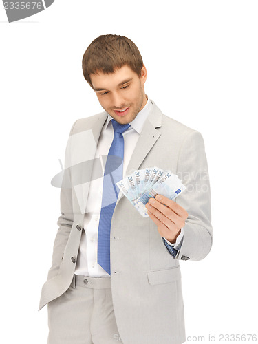 Image of handsome man with euro cash money