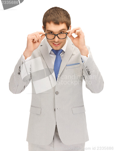 Image of happy businessman in spectacles