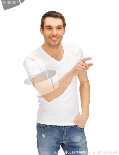 Image of man in white shirt pointing his finger