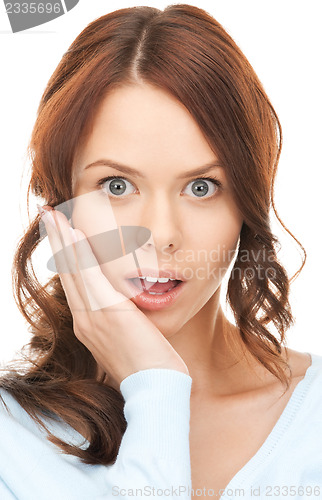 Image of woman with hand over mouth