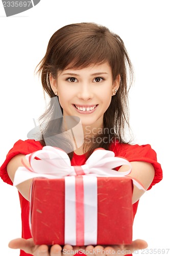 Image of happy teenage girl with gift box